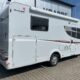 Familie camper 4 persoons Fiat Ducato met langsbedden, Hefbed en electrischedak beluchting